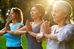 3 middle age women in standing meditation