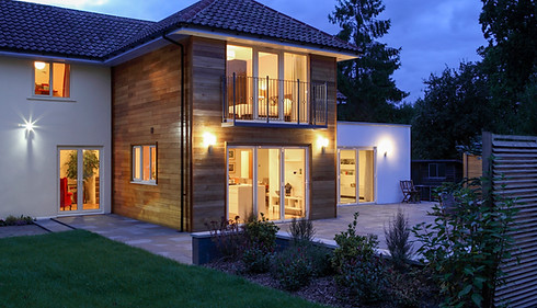 Large house illuminated in the evening