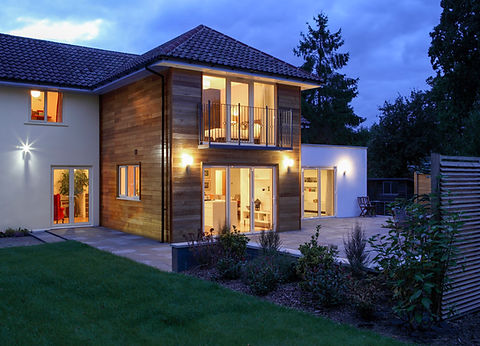 Large house illuminated in the evening