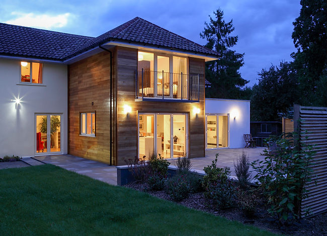 Large house illuminated in the evening