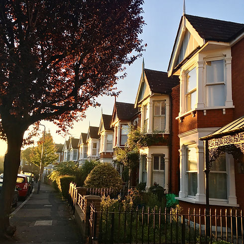 Street Amidst Buildings Against Sky