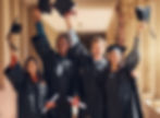 Graduates Holding Diplomas