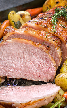 Roast pork with roast potatoes and carrots