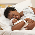 Mother Holding Newborn