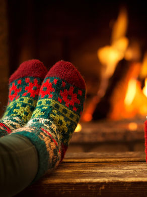 Socked feet and coffee by the fire