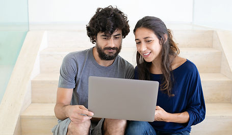 Couple Using Laptop