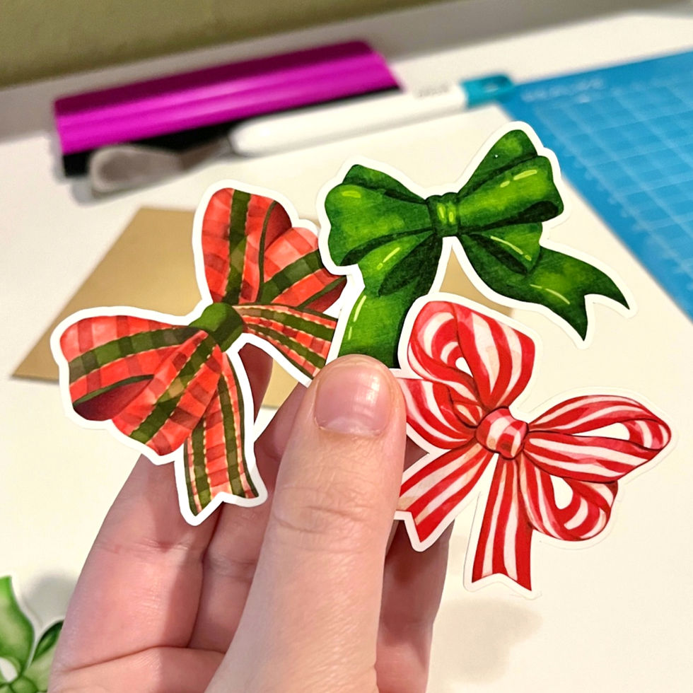Thumbnail: three vinyl bow stickers in hand