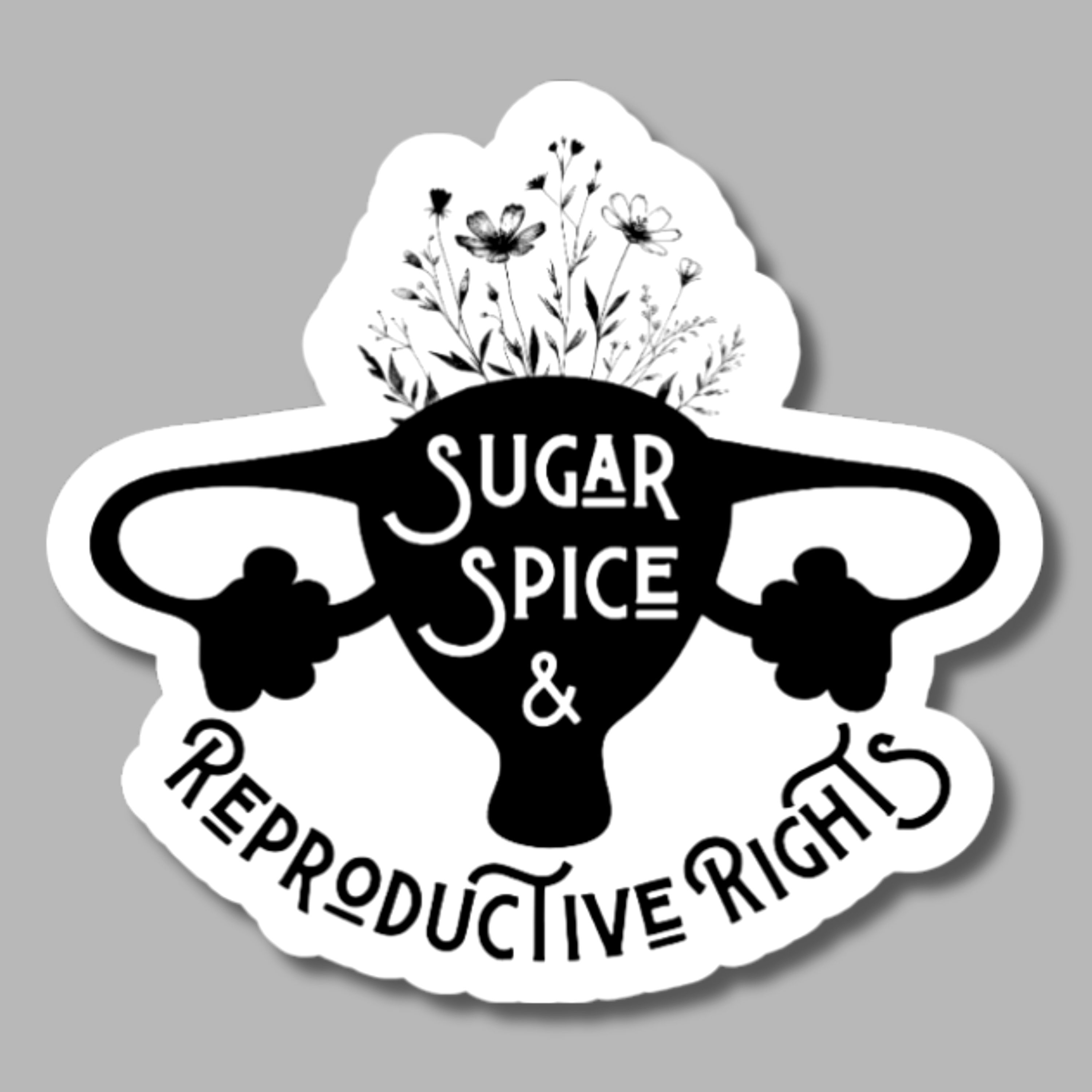 vinyl sticker of a uterus and flowers with the words "sugar spice and reproductive rights"