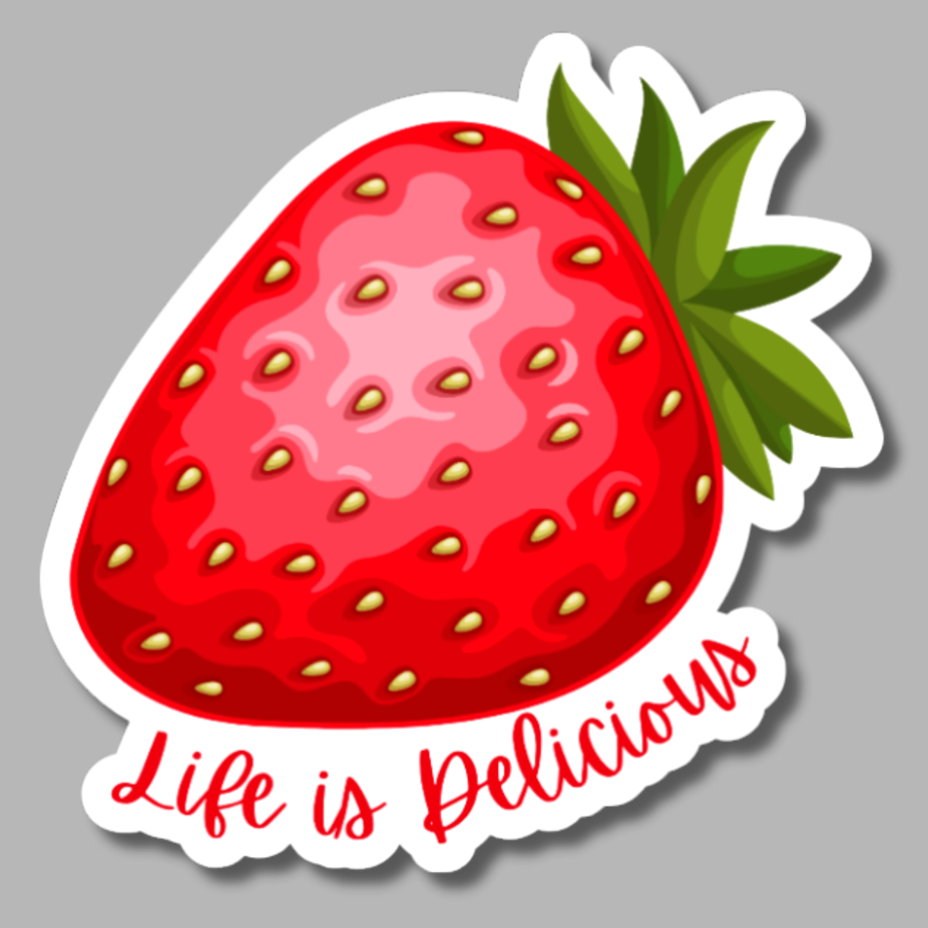 vinyl sticker of a strawberry and the words "life is delicious"