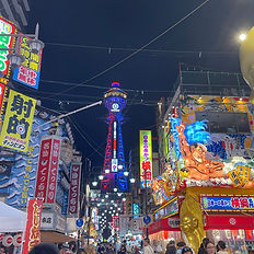 Shinsekai Walking Guided Tour - Osaka Step into Retro Osaka – Walk, Eat & Feel Shinsekai. Step back in time and uncover the nostalgic charm of Shinsekai on this relaxed 2-hour walking tour. Wander through retro streets filled with local flavor, vibrant eateries, and fascinating history, ending at Osaka’s iconic Tsutenkaku Tower. With a maximum of just 6 guests, this experience offers a more personal and intimate way to explore one of Osaka’s most colorful neighborhoods. Tour Highlights Meeting Point – Ebisucho Station (Exit 3) Your journey begins at Ebisucho Station, Exit 3. Here, your guide will introduce Shinsekai’s unique story—an area inspired by Paris and New York in the early 20th century. Janjan Yokocho Alley Step into the lively Janjan Yokocho Alley, a nostalgic street lined with traditional eateries and retro game arcades. This is the perfect place to try kushikatsu (Osaka’s famous fried skewers) and soak in the warm, down-to-earth atmosphere of local life.