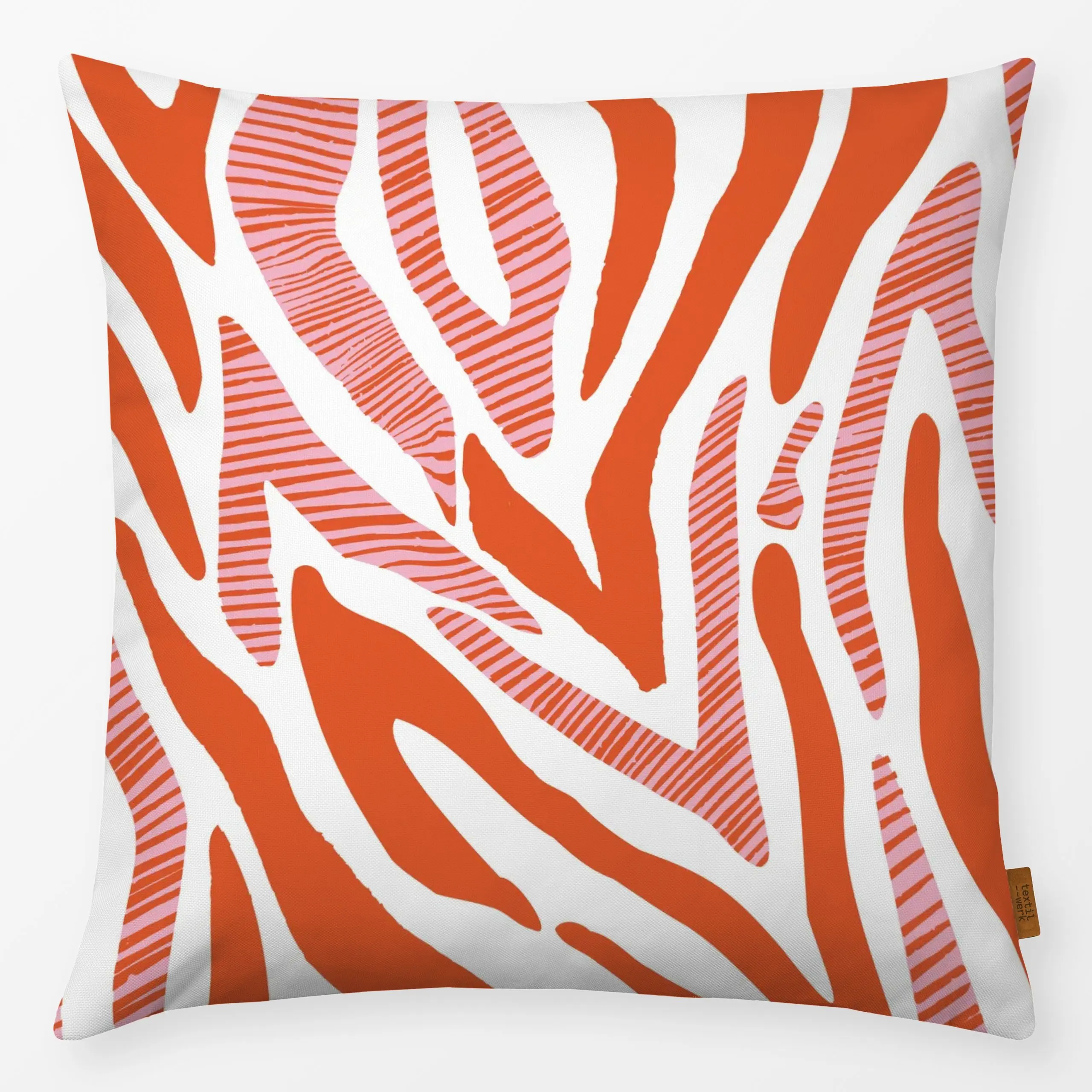Orange and white cushion with bold abstract zebra stripe pattern by moDeern for Textilwerk