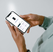 click2charge app auf einem smartphone in der hand