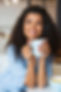 young-woman-having-cup-coffee.jpg