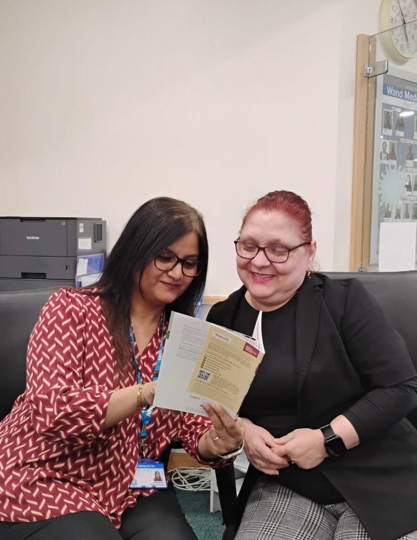 Picture of staff member with a client