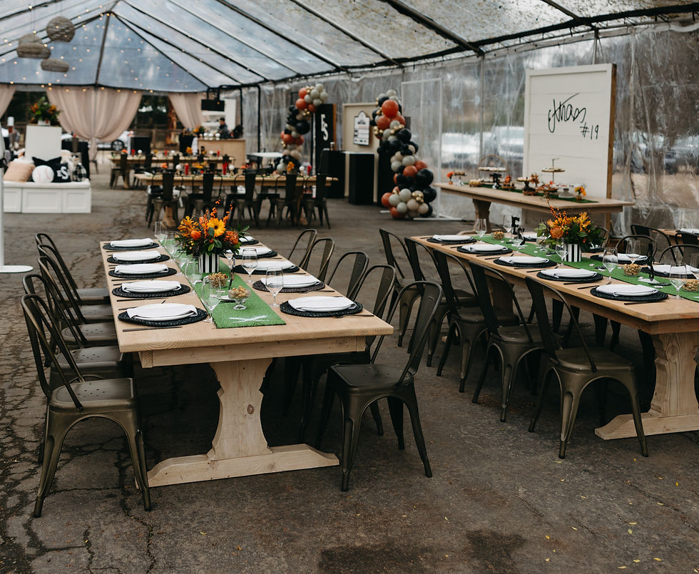 Thumbnail: Decorated tables inside a clear event tent