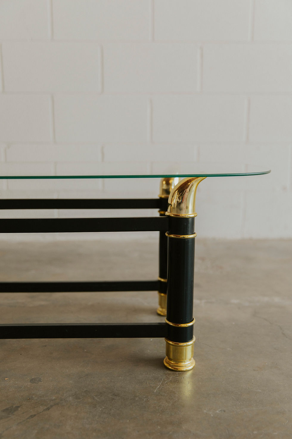 Thumbnail: Glass table with black and gold column legs