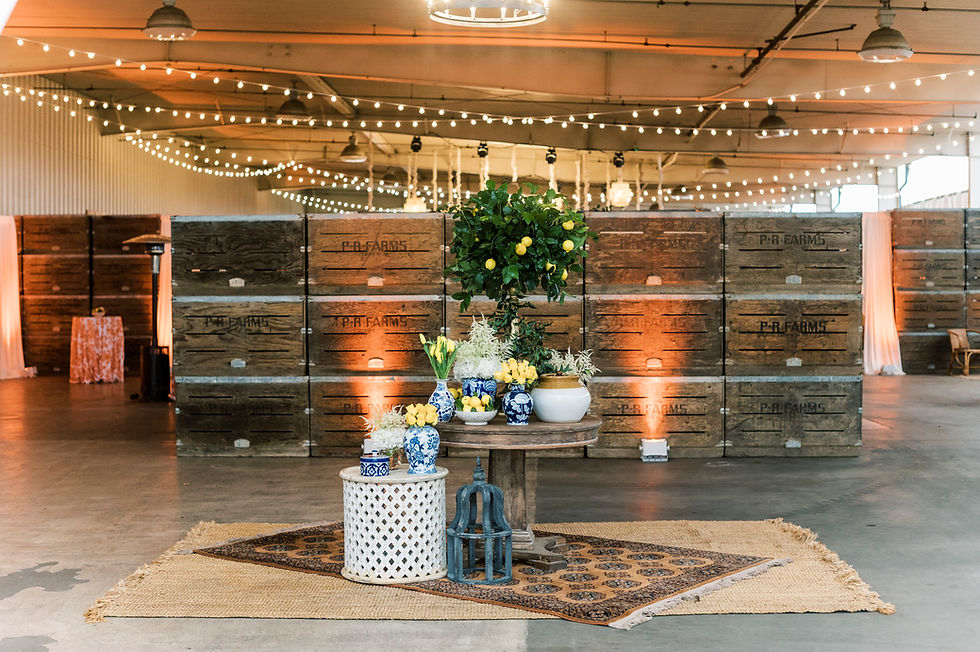 Thumbnail: Event decor with lemon tree centerpiece and string lights