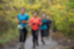 group-of-four-adults-jogging-together-on-a-forest-2025-04-05-05-59-36-utc.jpg