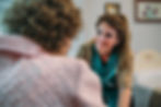 doctor-talking-to-elderly-patient-in-a-wheelchair-2023-11-27-05-24-09-utc.jpg