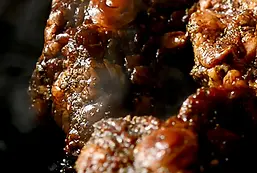 Southern-Oxtails-Seared-in-a-Cast-Iron-Skillet.webp