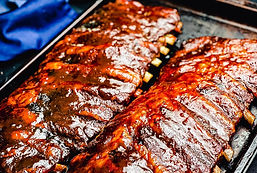 sauced-pork-ribs-on-a-baoking-sheet.jpg