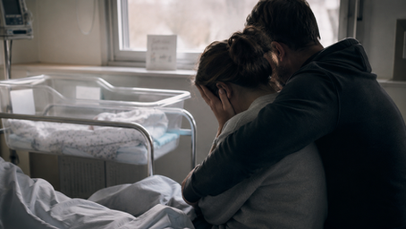 young couple grieving