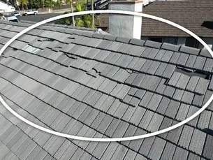 Displaced Roofing Tiles