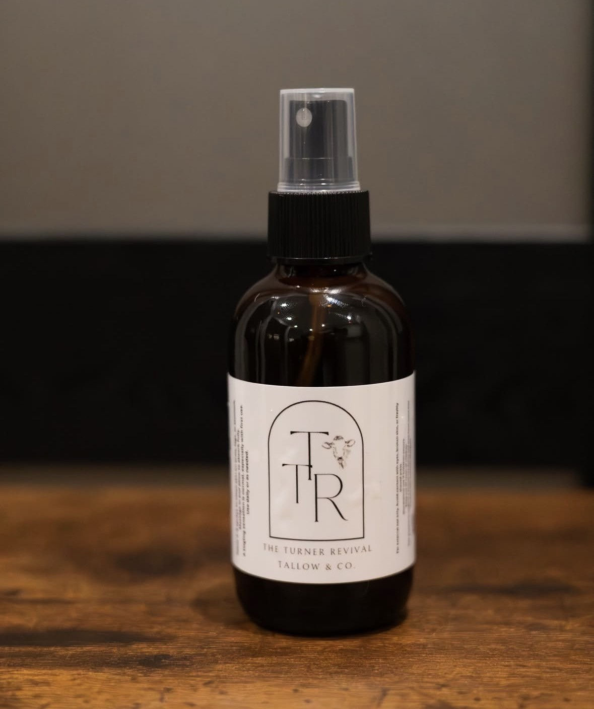 Spray bottle with white label reads: T|R, Lavender Blossom Tallow Balm.