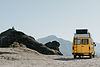 vehicle-parked-mountain-against-clear-sky.jpg