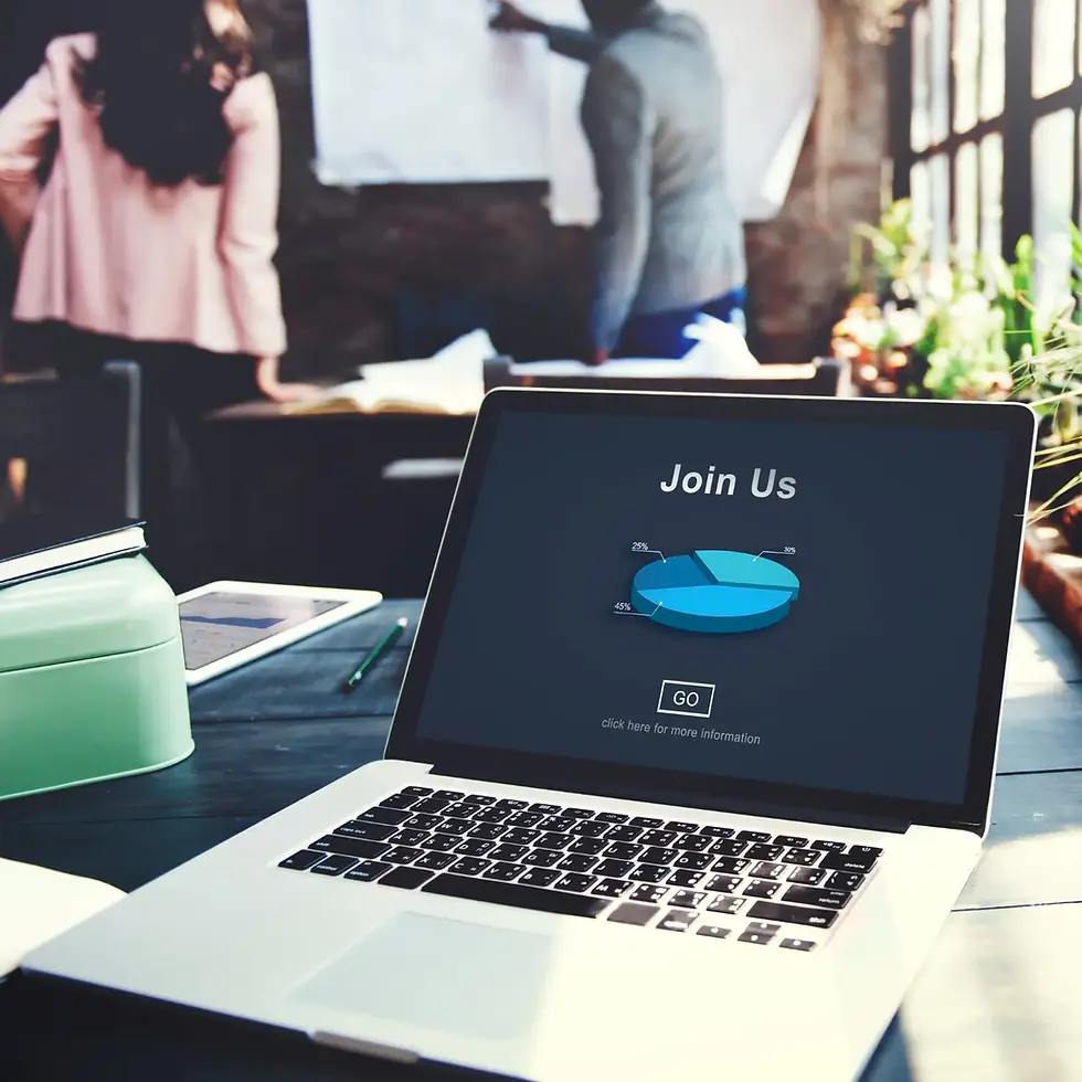 Laptop screen with 'Join Us' and a pie chart