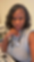 Black woman doctor with stethoscope, looking at the camera, inside office.
