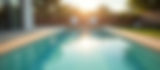 Inviting backyard pool scene with lounge chairs