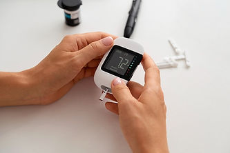 high-angle-diabetic-woman-checking-her-glucose-level-1.jpg