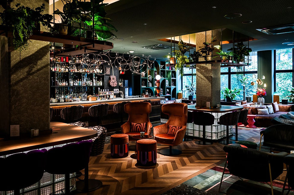 The LivingRoom & Bar is a vibrant hotspot in Dada style – the highlight of the Home Hotel Zürich.