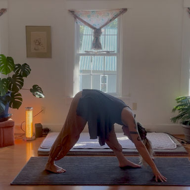 A person doing yoga on an axis mat