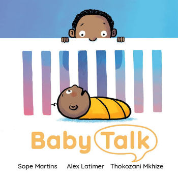 A young black boy peers over the cribat his baby sister.