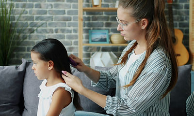 Hairstylist doing hair