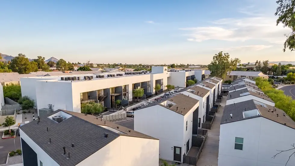 Downtown Phoenix apartment buildings and skyline at dusk along the Central Avenue corridor
