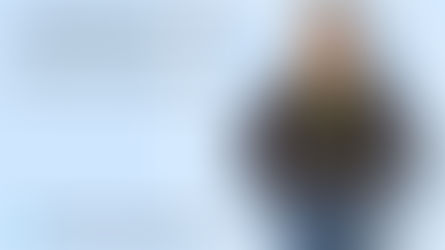 Georgia Townsend stood smiling with hands in pockets in front of a light blue background. Image also contains text "Persistence is key." and "What's next after a CILEX Level 6 Qualification?" with the Northwood Banks logo in the bottom left.