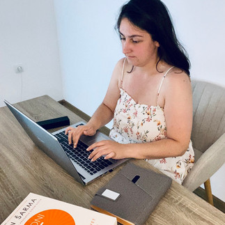 A girl working on her laptop - things I don't like on a Monday