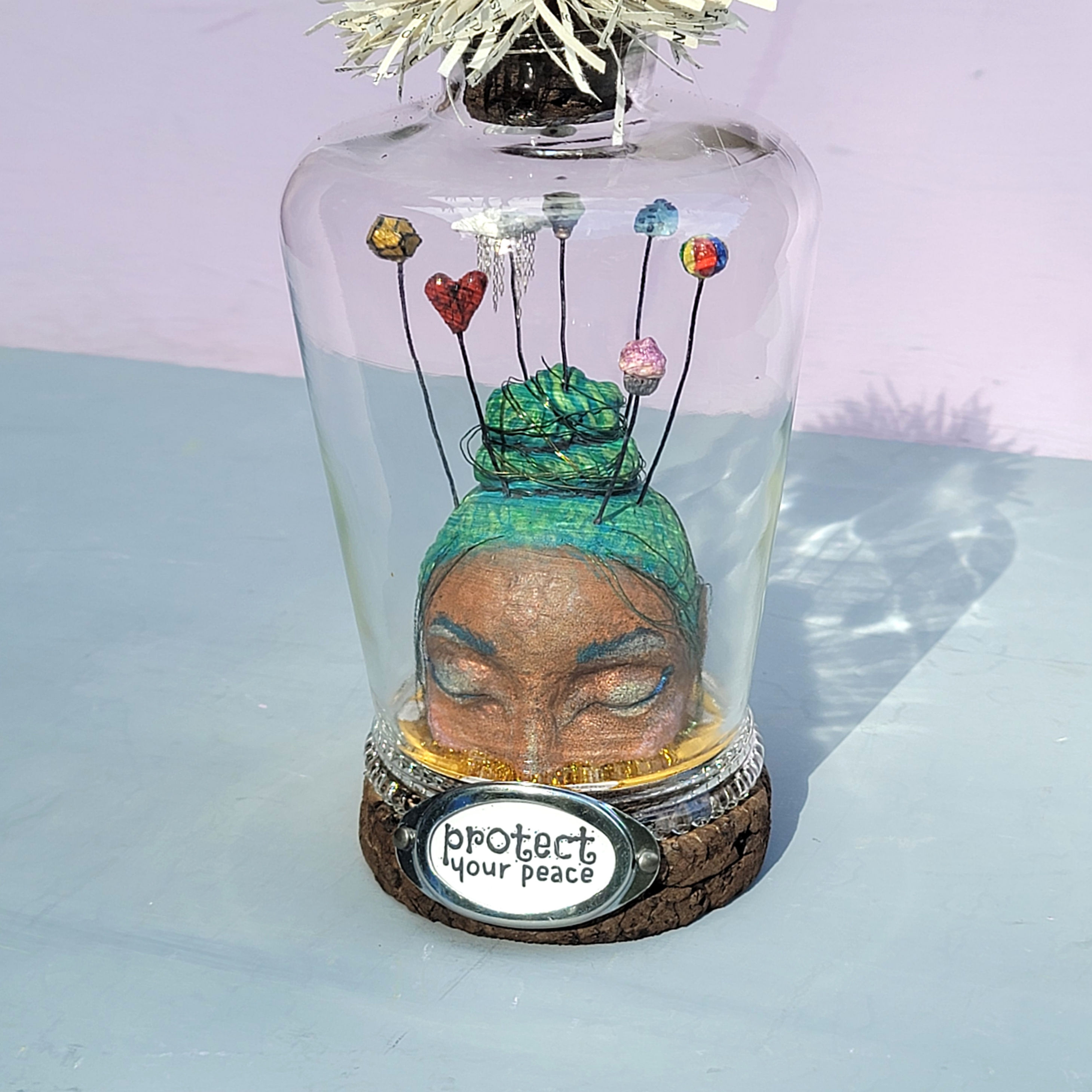paper mache woman bust with glass cloche