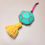 Thumbnail: faceted green paper mache mirror ornament with tassel