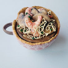 A ramen noodle style paper mache keepsake box