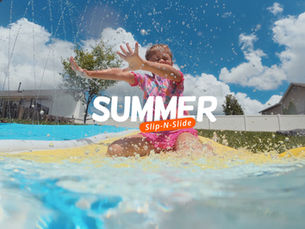 Child racing down a Slip ’N Slide in a social media video production by 24Frames