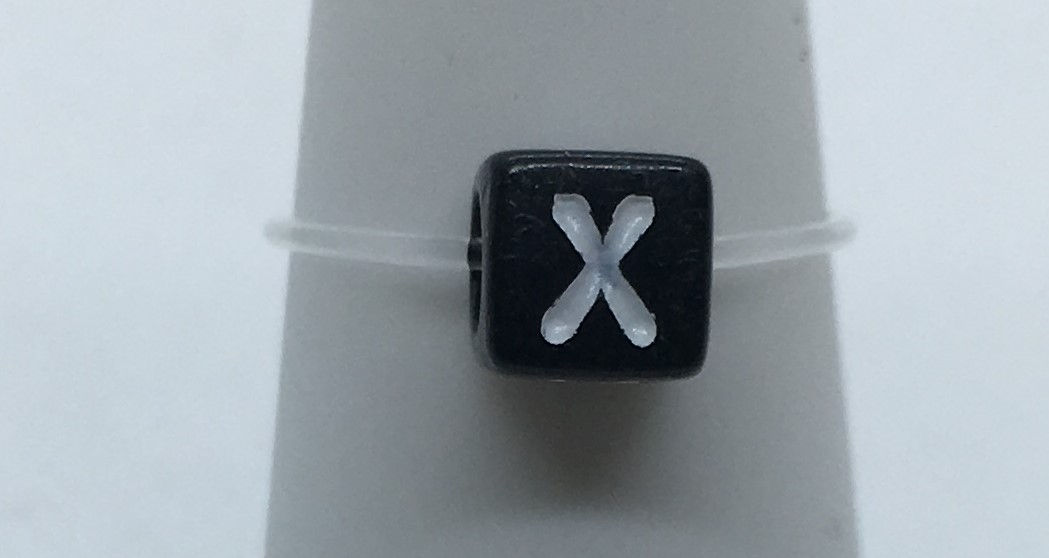 Black X Inital Stretch Toe Ring