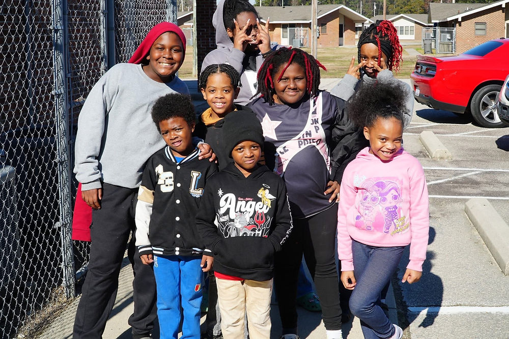 Group of smiling children outdoors