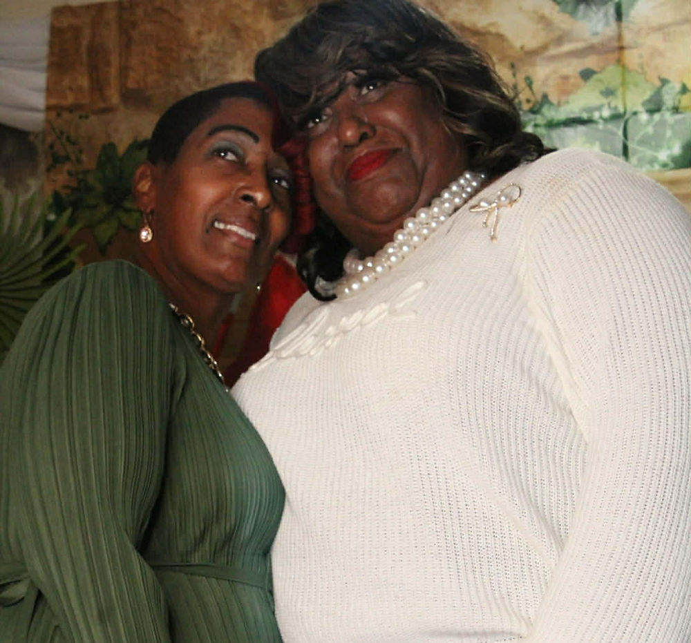 Two women smiling together