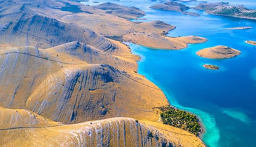 Private luxury boat with guests relaxing in Kornati