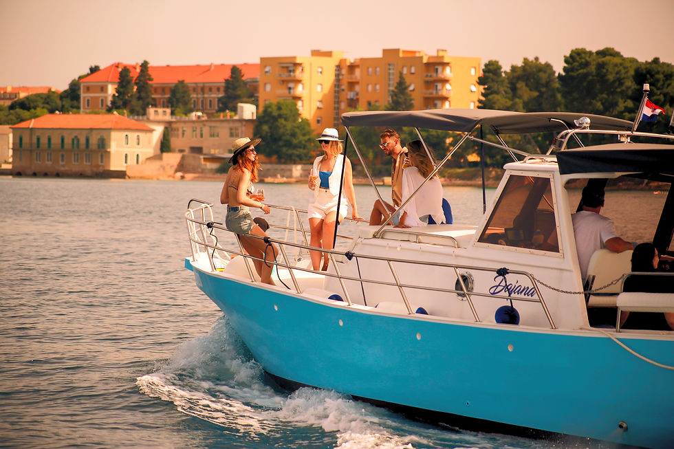 High angle view of a private boat cruising near Zadar coastline with clear blue water