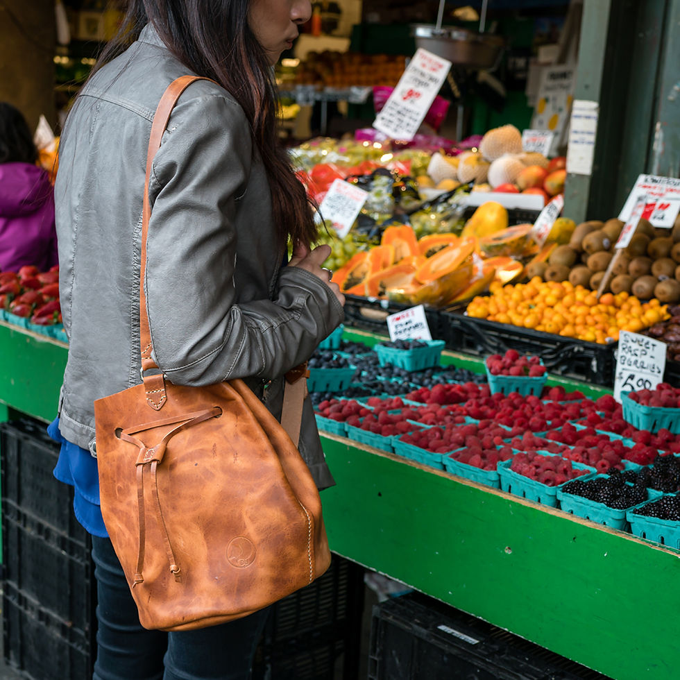 Thumbnail: leather sling bucket bag handcrafted American Horween brown and black Harbor by Dunole